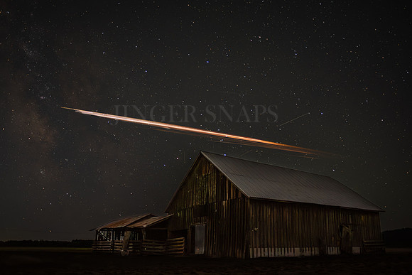 Space Stuff over a Weathered Barn